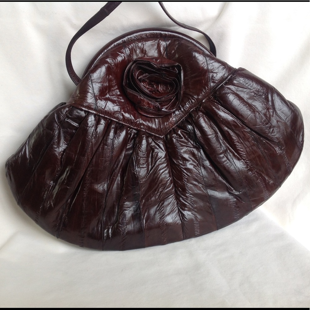 Eel skin leather clutch, rose decorated excellent